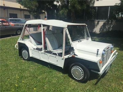 medium_4266865e-304a-48a5-ab86-1204b67ecdf3_austin-mini-moke-portugal%5B1%5D.jpg
